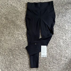 Unworn Base Pace HR Crop 23”